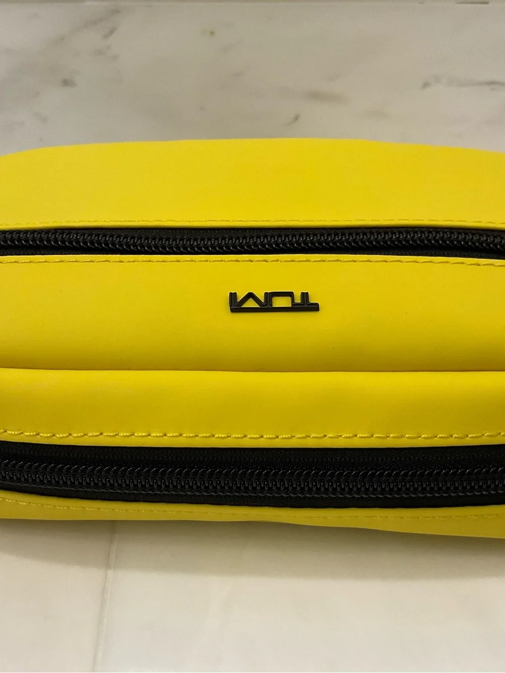 Tumi up sale
